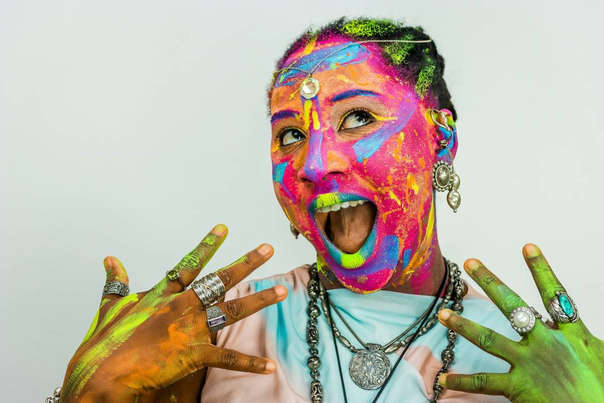Before and after photo of festival makeup using safe colorful party cosmetics—vibrant at start, intact after 6 hours in heat