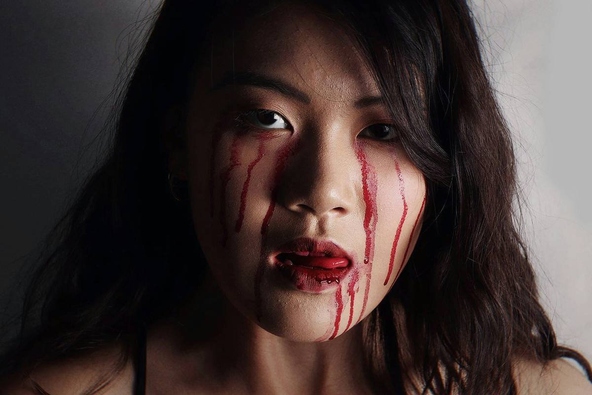 Close-up of special effects makeup for gore showing layered wound with realistic texture and matte finish